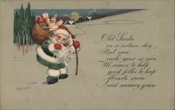 Santa Claus Walking Through the Snow at Night Toward a Town Postcard Postcard Postcard