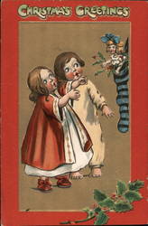 Two Young Girls Looking at a Doll in a Stocking Children Postcard Postcard Postcard