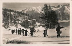 Skiers walking toward Chantarella in St. Moritz Switzerland Postcard Postcard Postcard