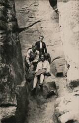 Three People Hiking in a Narrow Canyon Passage Postcard