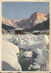 Winter Scene with Snow Covered Barns and Creek, Austria Postcard