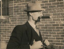 Man with Cigar and Hat 