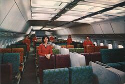 Cathay Pacific Airline Interior with Flight Attendants Postcard