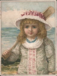Girl in Hat with Shovel at Beach Trade Card