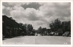 Clayton, GA Main Street Scene with Eagle's Cafe, Ford, Standard Oil Postcard