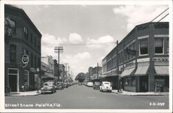 Vintage Palatka Florida Street Scene Downtown Main Street Cars Postcard