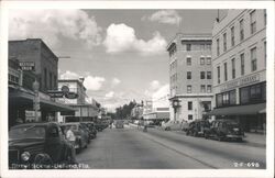 Deland, Florida Street Scene with J.C. Penney and Western Union Postcard