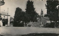 Školsan - View of a church and town square Postcard