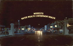 Modesto Arch At Night California Postcard Postcard