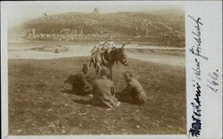 Three men and a donkey Unidentified People Postcard Postcard