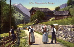 villagers on the Klausenstrasse mountain road near Spiringen Switzerland Postcard Postcard