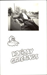 Holiday Greetings Man in Cart Unidentified People Postcard Postcard