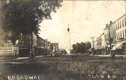 Broadway Street Scene Larned, KS Postcard Postcard