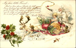 White Robe Santa with Child on Sleigh Santa Claus Postcard Postcard