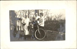 Family with Bicycle Postcard