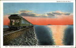 Train Crossing Great Salt Lake Cut Off At Sunset Postcard