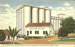 The Birthplace Of Post Products In The Shadow Of Modern Grain Storage Tanks Battle Creek, MI Postcard Postcard