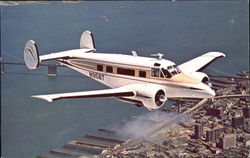 The Beechcraft Super H18 Over San Francisco Postcard