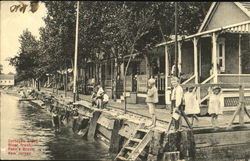 Cottages Along River Front Postcard