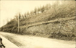 Road cut through hills Postcard