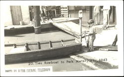 Ties Rowboat To Park Meter Postcard