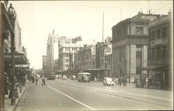 A view looking down the street Postcard