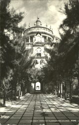 Grand Building with Tree-Lined Stone Entrace Postcard