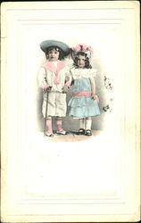 Two children in Edwardian dress Postcard