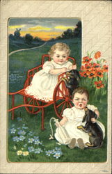 Two children with puppies Postcard