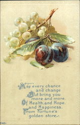 To dark red plums with stem and leaves, and a bunch of green grapes Fruit Postcard Postcard