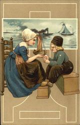 Dutch mother and son with boats Postcard