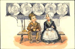 Dutch boy and girl with tea Postcard