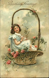 Girl sitting in a basket with flowers Postcard