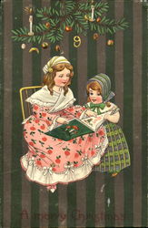 Two girls reading a book Postcard