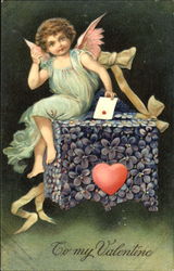 Cupid atop Table of Purple Flowers Postcard Postcard