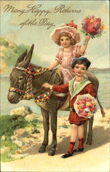 Two children and a donkey Postcard