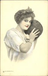 Woman holding a medicine ball Postcard Postcard