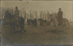 Men herding horses in corral Postcard