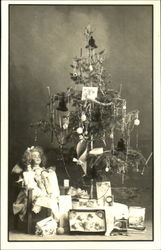 Presents under a Christmas tree Postcard