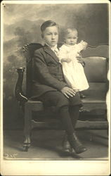 Children sitting on Bench Postcard