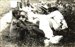 Man shaving his friend Postcard