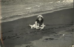 Tahitian woman lying on the beach South Pacific Postcard Postcard