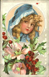 Young blond girl with blue hood and bow with christmas flowers Postcard