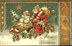 Santa carrying toys on a bicycle Santa Claus Postcard Postcard