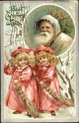 Santa in portrait looking on two girls sweeping Postcard