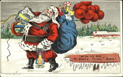 Santa with his toys in the snow Santa Claus Postcard Postcard