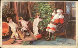 Santa sitting in a chair with Three small children around the tree Santa Claus Postcard Postcard