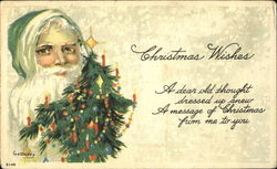 Santa in with his long white beard surrounded by green Pine tree Santa Claus Postcard Postcard