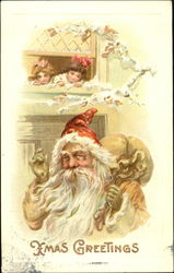 Santa with a bag of toys, two girls watching Santa Claus Postcard Postcard