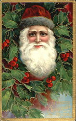 Santa in a red hat with grey trim is framed in holly Santa Claus Postcard Postcard